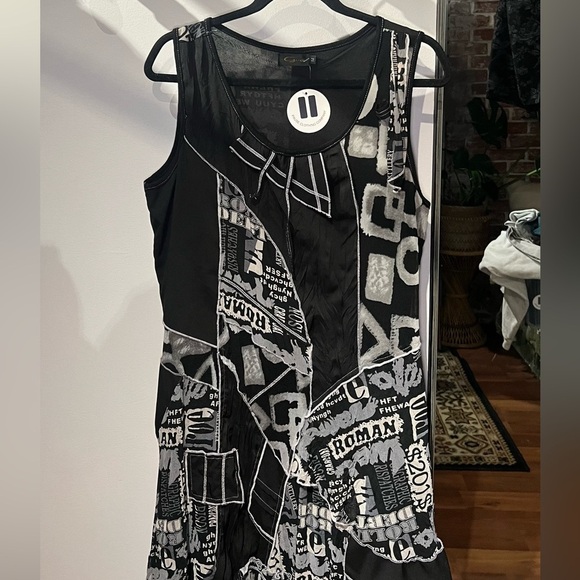 Dresses & Skirts - Newspaper dress with black and white patchwork layers​